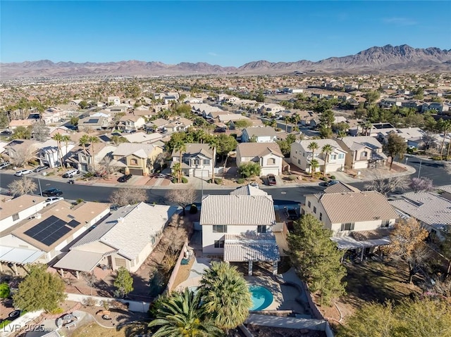 drone / aerial view featuring a mountain view and a residential view