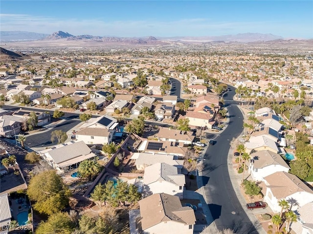 birds eye view of property featuring a mountain view and a residential view