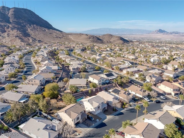 drone / aerial view with a mountain view and a residential view