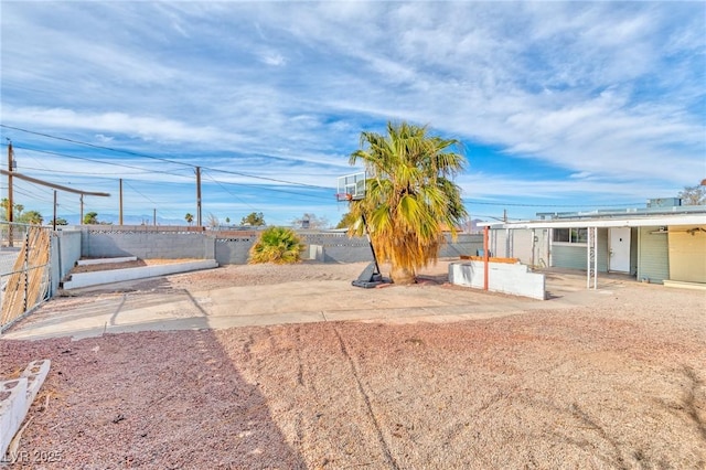 view of yard with a patio area and a fenced backyard