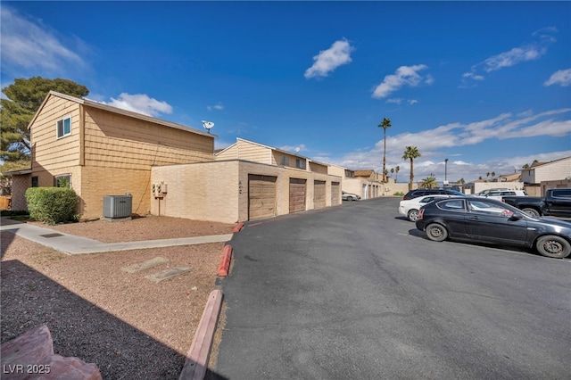 view of road with community garages