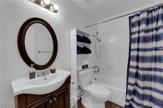 full bath featuring vanity, shower / bath combination with curtain, toilet, and wood finished floors