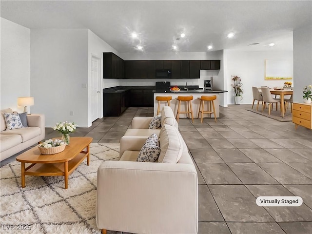 living room featuring light tile patterned floors