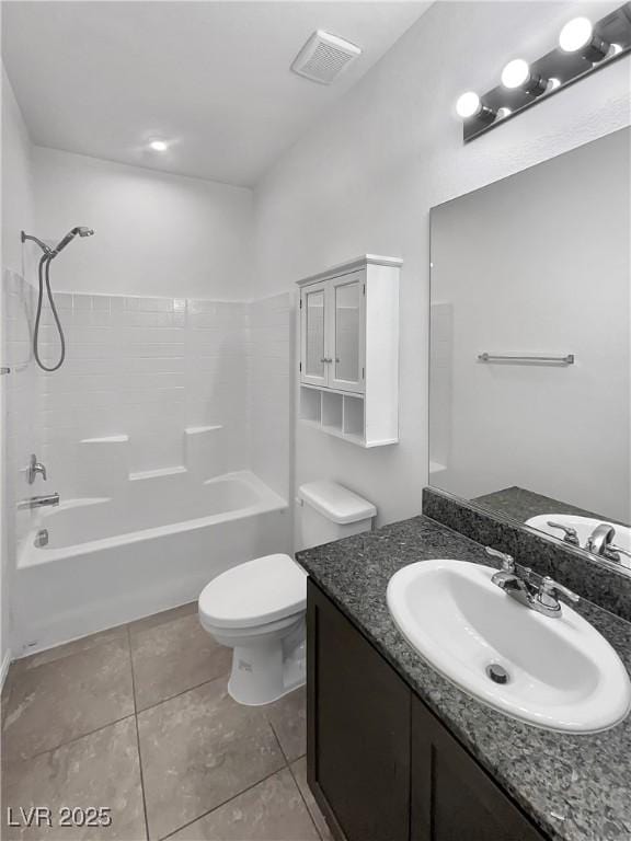 bathroom featuring tile patterned flooring, toilet, washtub / shower combination, and visible vents