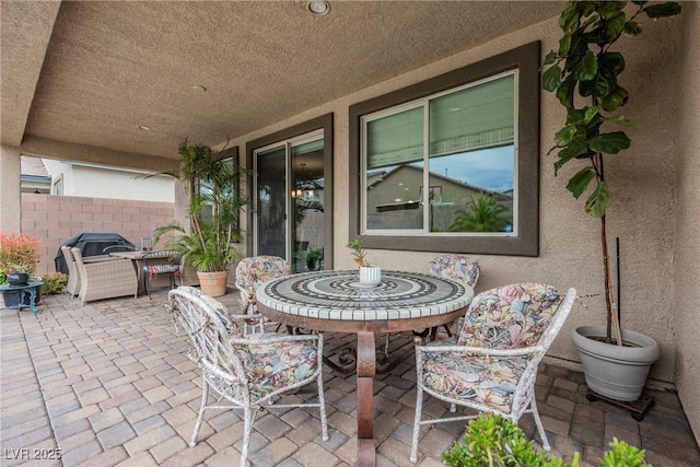 view of patio / terrace with fence