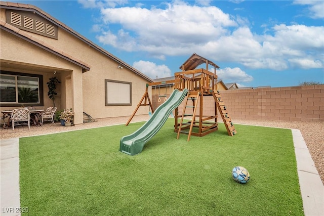 view of play area featuring a fenced backyard