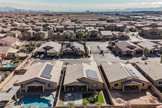 birds eye view of property with a residential view