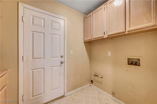 laundry area featuring cabinet space, light tile patterned floors, baseboards, gas dryer hookup, and hookup for a washing machine