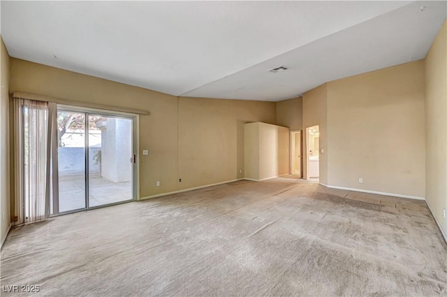 carpeted empty room with baseboards and visible vents