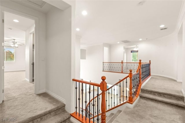 stairway featuring visible vents, recessed lighting, baseboards, and carpet