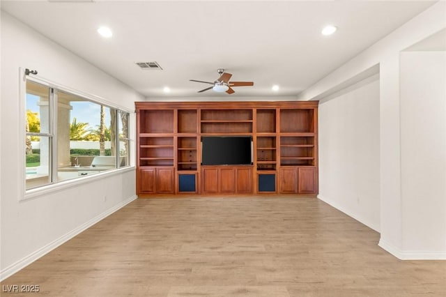 unfurnished living room with light wood finished floors, visible vents, recessed lighting, and baseboards