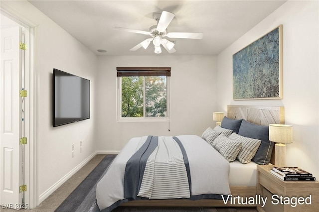 carpeted bedroom with baseboards and ceiling fan