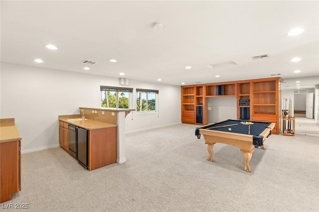 playroom featuring light carpet, recessed lighting, visible vents, and a sink