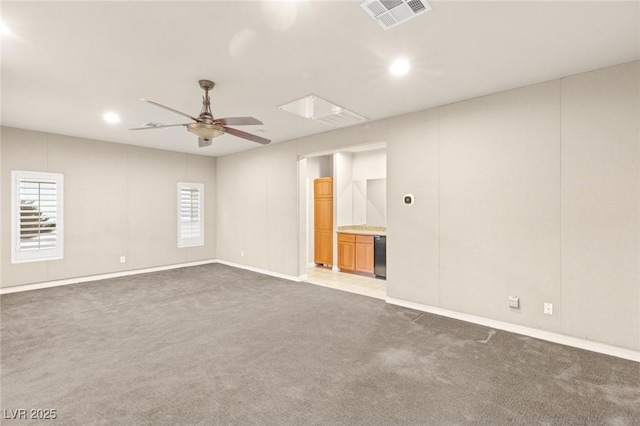 spare room featuring recessed lighting, carpet flooring, a ceiling fan, and visible vents