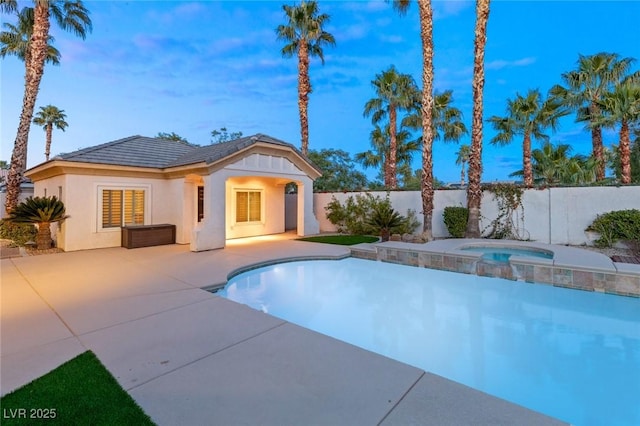 view of swimming pool with an in ground hot tub, a fenced backyard, a fenced in pool, and a patio