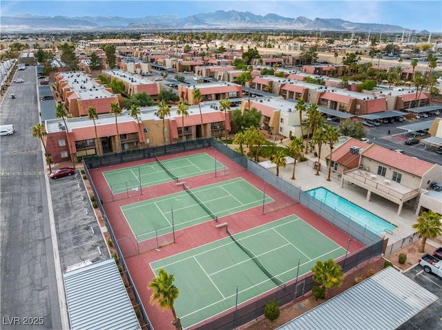 aerial view featuring a mountain view and a residential view