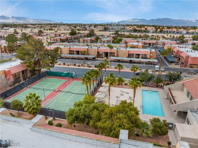 birds eye view of property featuring a mountain view