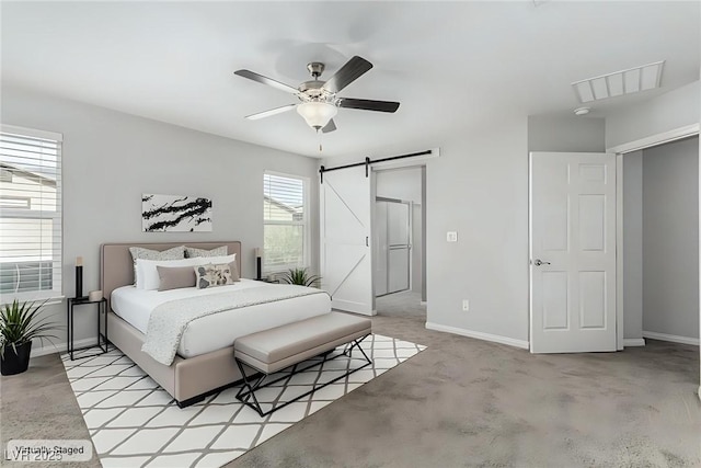 bedroom featuring visible vents, a barn door, baseboards, light colored carpet, and ceiling fan