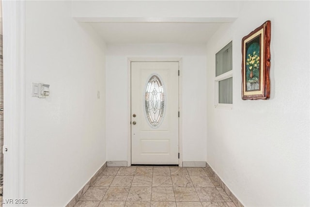 doorway with baseboards