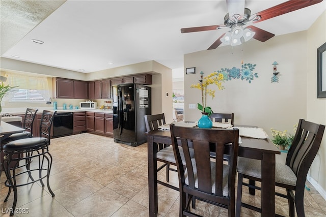 kitchen featuring a ceiling fan, baseboards, recessed lighting, black appliances, and light countertops