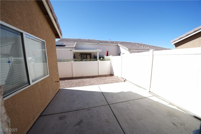 view of patio featuring a fenced backyard
