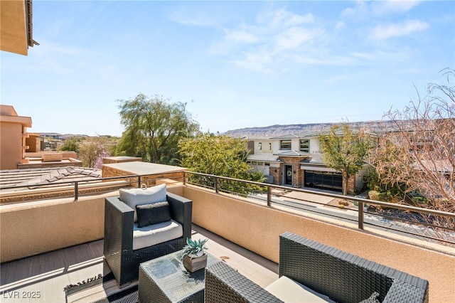 balcony featuring a residential view