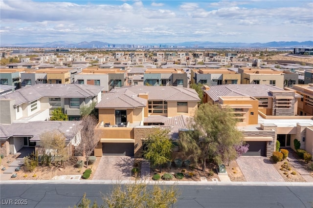 aerial view with a mountain view and a residential view