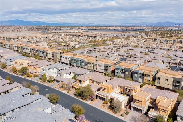 bird's eye view featuring a mountain view and a residential view