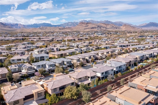 drone / aerial view featuring a mountain view and a residential view