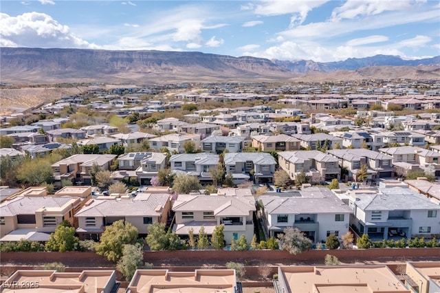 aerial view with a mountain view and a residential view