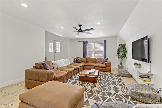 living room with lofted ceiling, a ceiling fan, recessed lighting, light tile patterned flooring, and baseboards