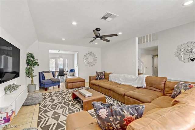 living area featuring visible vents, a ceiling fan, recessed lighting, stairway, and light tile patterned floors