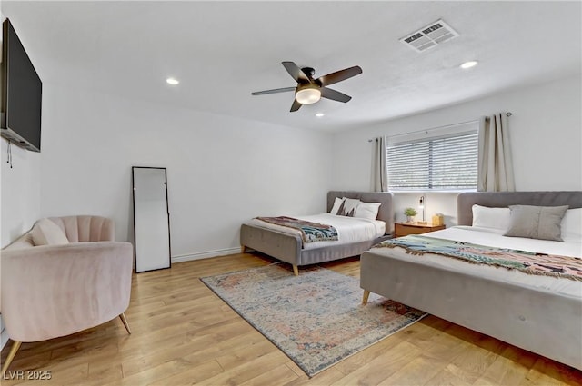 bedroom featuring visible vents, recessed lighting, and light wood-type flooring