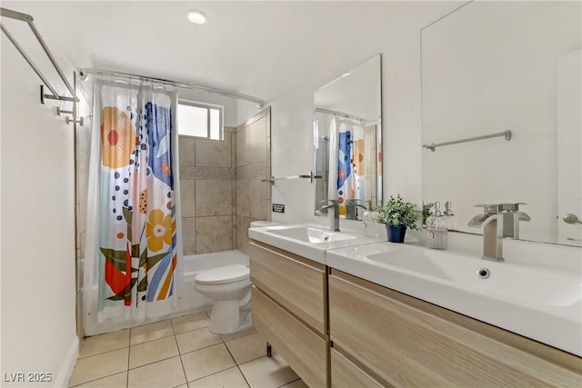 full bathroom featuring a sink, shower / bathtub combination with curtain, toilet, and tile patterned floors