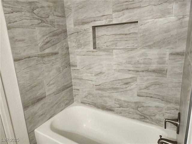 bathroom featuring shower / bathtub combination