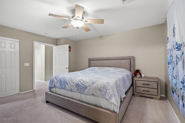 bedroom featuring baseboards, carpet, and ceiling fan