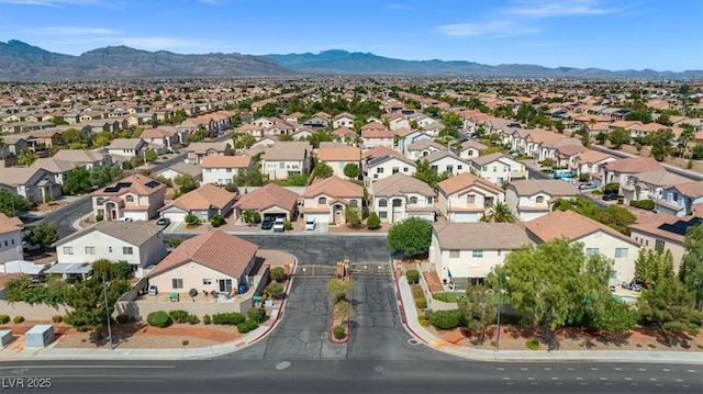 bird's eye view featuring a mountain view and a residential view