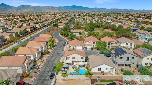 bird's eye view with a residential view and a mountain view