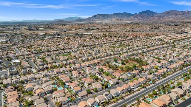 birds eye view of property featuring a mountain view and a residential view