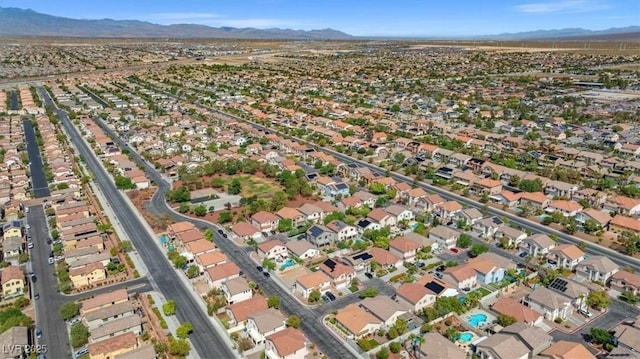 birds eye view of property featuring a residential view and a mountain view