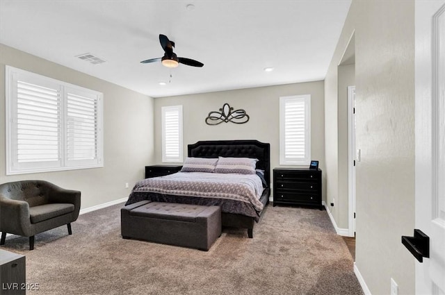 bedroom featuring baseboards, visible vents, carpet floors, and ceiling fan