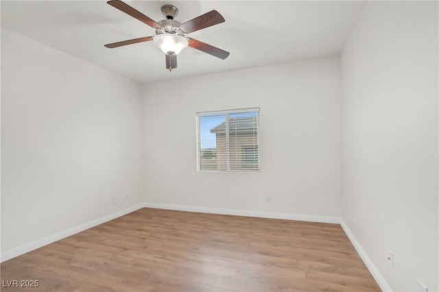 unfurnished room featuring light wood-style floors, baseboards, and ceiling fan