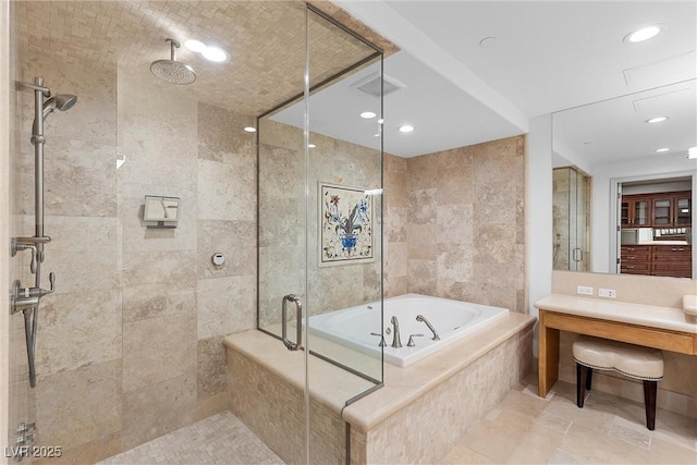 bathroom with a shower stall, a bath, recessed lighting, and visible vents