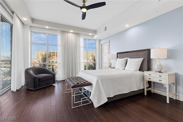 bedroom with ceiling fan, wood finished floors, and recessed lighting