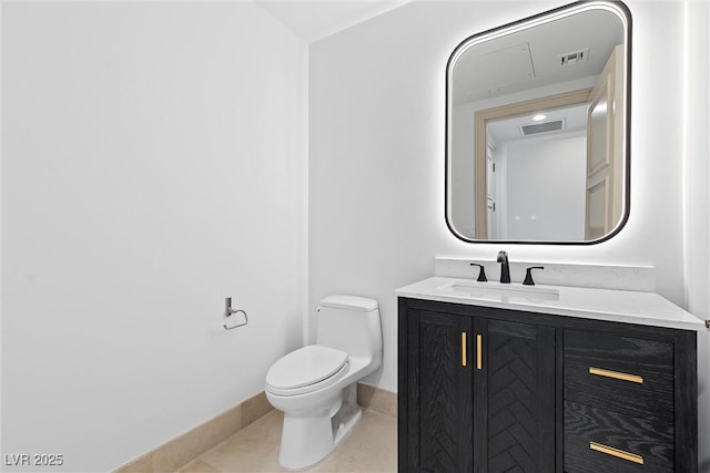 half bathroom with visible vents, toilet, vanity, and tile patterned flooring