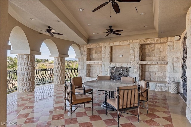 view of patio / terrace with outdoor dining area, a ceiling fan, and fence