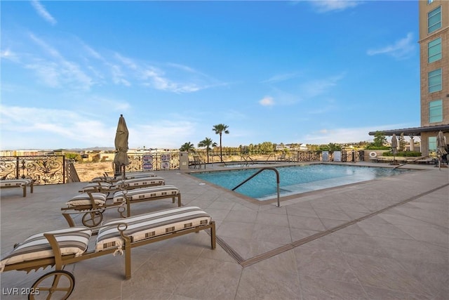 pool featuring a patio area