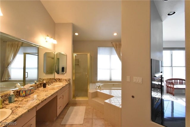 full bathroom featuring tile patterned floors, a stall shower, recessed lighting, double vanity, and a bath