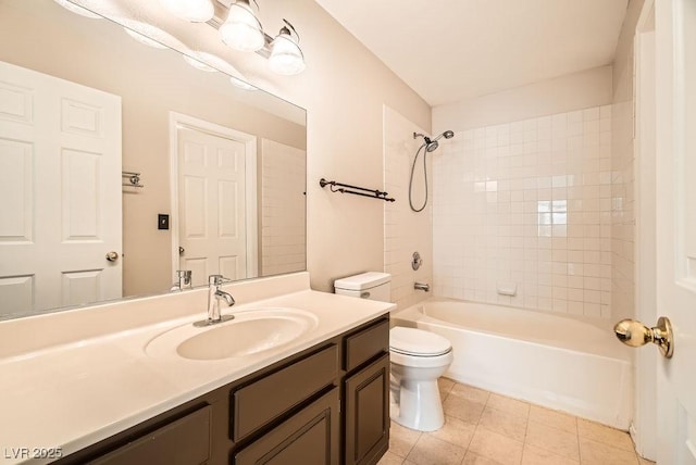 bathroom with tile patterned floors, shower / washtub combination, toilet, and vanity