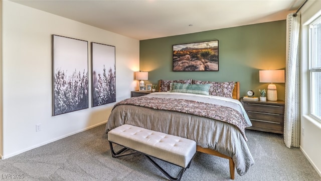 bedroom with carpet and baseboards